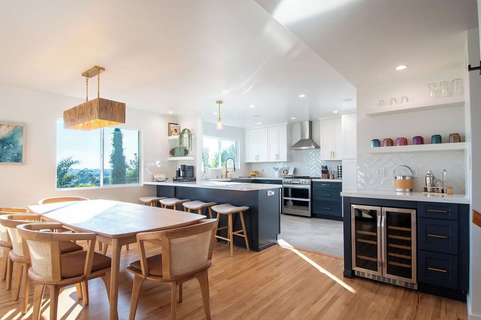 Enjoy a gourmet kitchen featuring high-end appliances, generous counter space, and a seamless connection to the dining area.