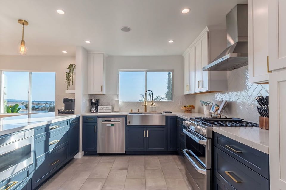 Designed for cooking together, this gourmet kitchen offers high-end appliances, ample workspace, and an open layout.