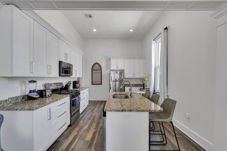 Fully-equipped & stocked kitchen w/ stainless steel appliances (gas oven/stove, microwave, dishwasher, refigerator/freezer), drip & Keurig coffee, toaster, electric kettle, and bar & cafe table seating.
