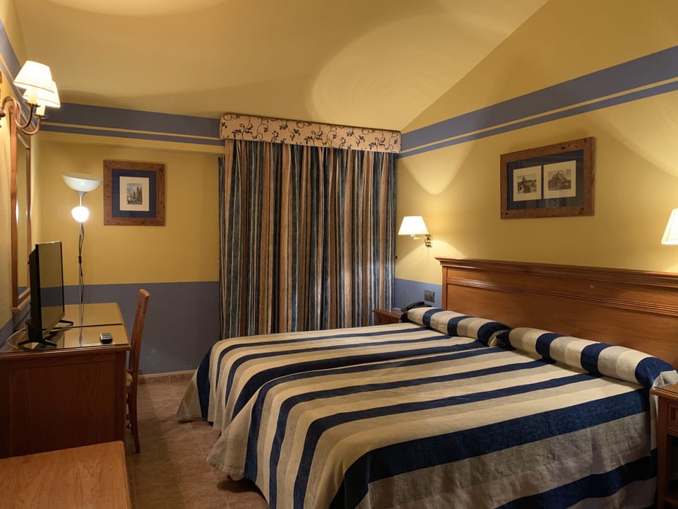 In-room safe, desk, iron/ironing board (on request), cribs (free)