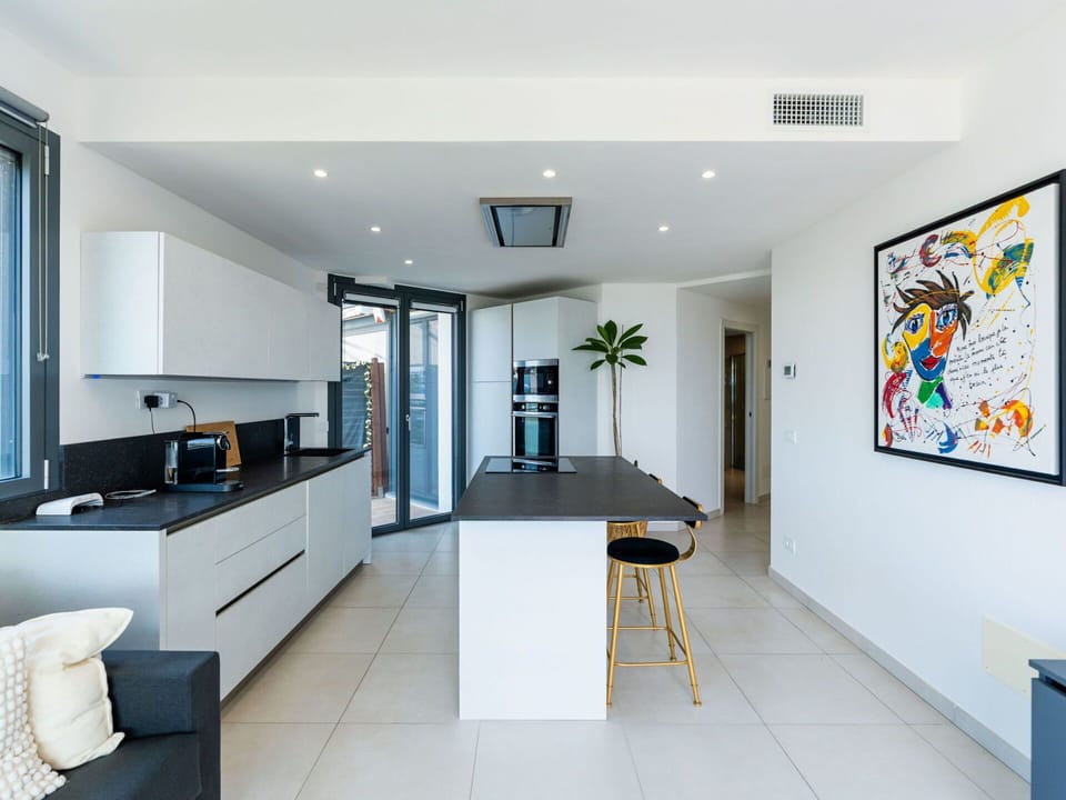 Furniture, Interior Design, Flooring, Floor, Countertop, Kitchen, Wall, Ceiling, Wood, Light Fixture