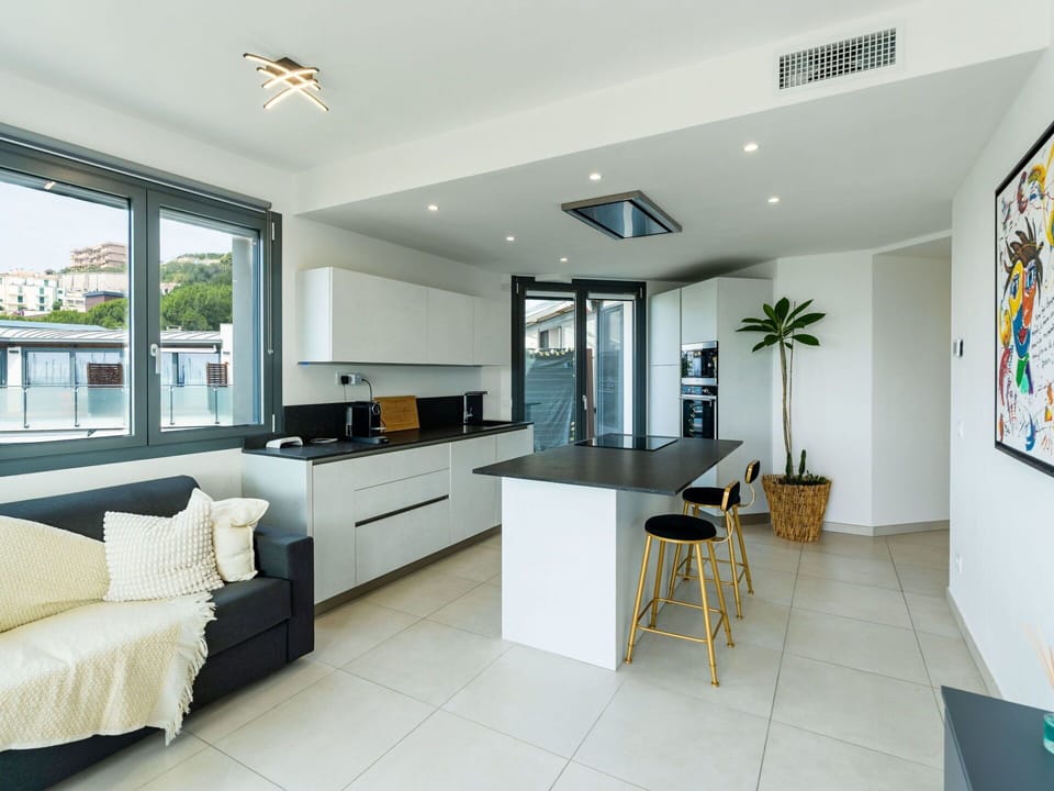 Furniture, Interior Design, Flooring, Floor, Kitchen, Countertop, Ceiling, Wood, Light Fixture, Cabinetry