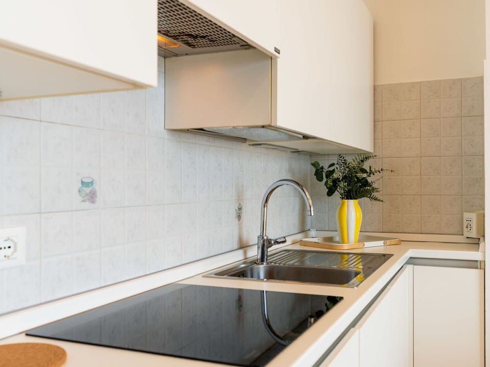 Kitchen, Countertop, Kitchen Appliance, Kitchen Sink, Interior Design, Flooring, Wood, Plumbing Fixture, Sink, Cabinetry
