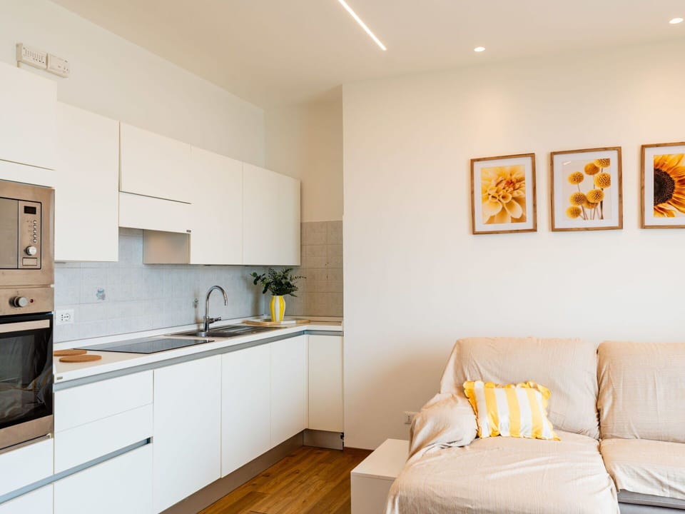 Furniture, Interior Design, Flooring, Kitchen, Wall, Floor, Countertop, Wood, Room, Ceiling