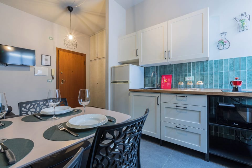 Apartment, 1 Bedroom | Private kitchen | Full-size fridge, microwave, stovetop, espresso maker