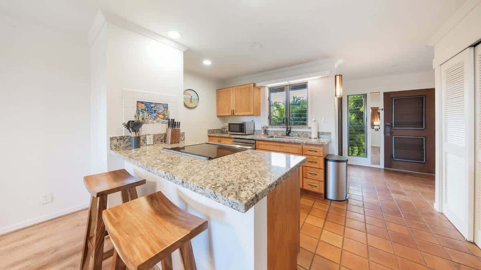 Kitchen area with bar seating