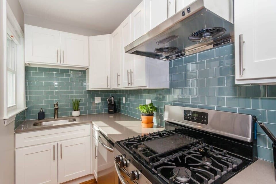 Kitchen features brand new applicances and essential cookware.