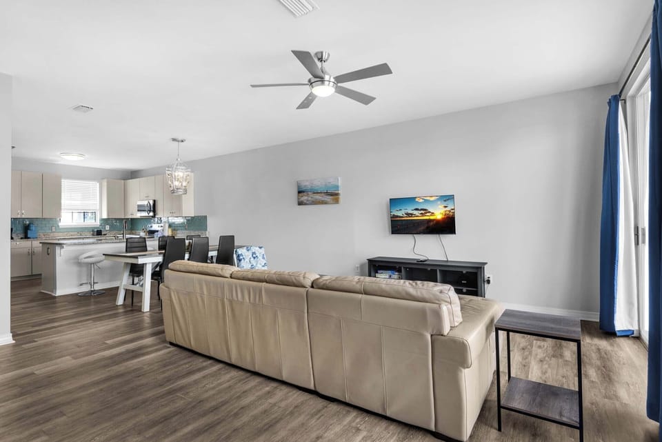 Living room with mounted flat-screen TV