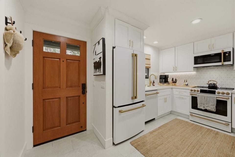 First impressions matter. From the custom wood entry door to the designer kitchen with brass accents, every detail of this newly renovated Silverado retreat has been crafted to deliver a sophisticated Napa Valley experience.