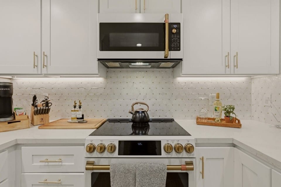 Stylish kitchen with top of the line appliances and wine refrigerator makes your Napa stay feel like home