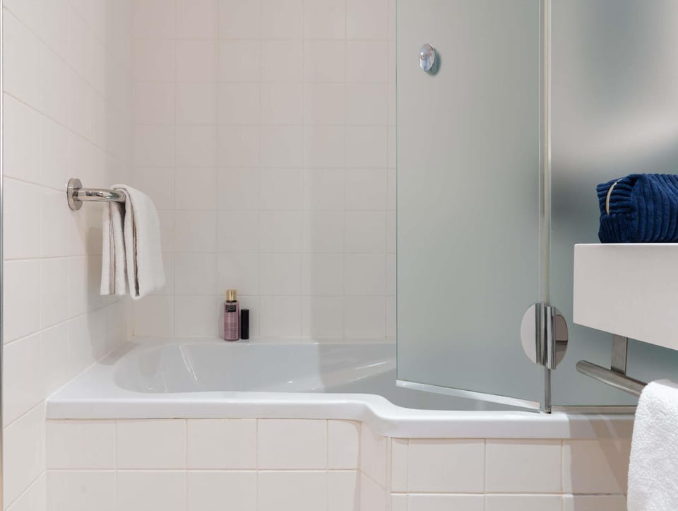 Eco-friendly toiletries, hair dryer, towels