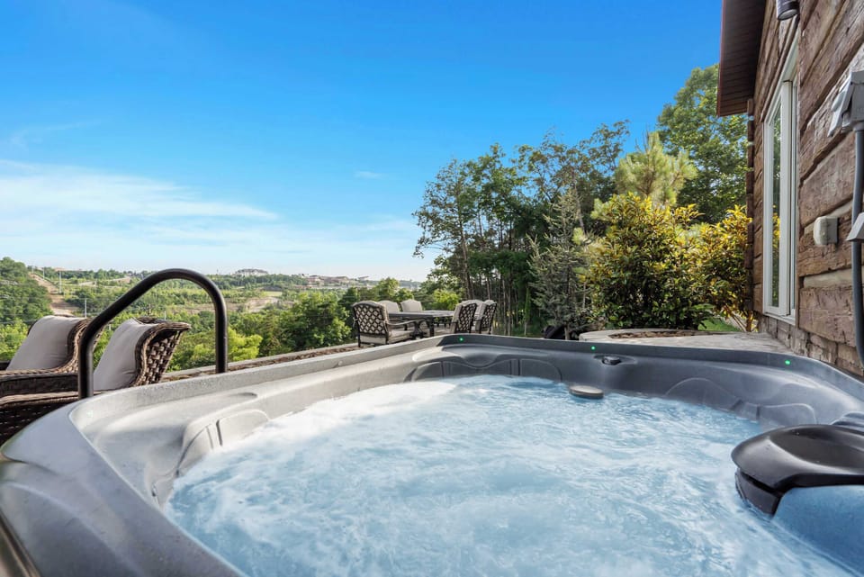 Relax on the patio or in the private hot tub with stunning views