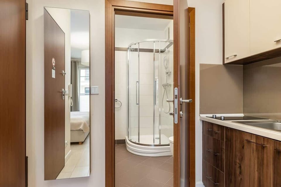 The bathroom offers a clean and functional space for your stay. 