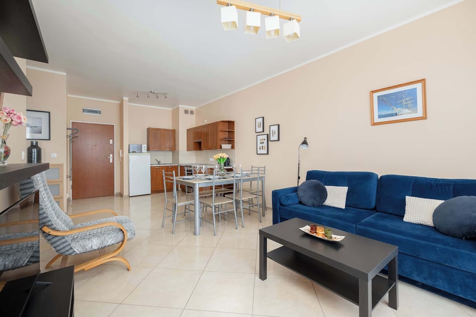Another perspective on the bright space of the living area combined with the kitchenette.
