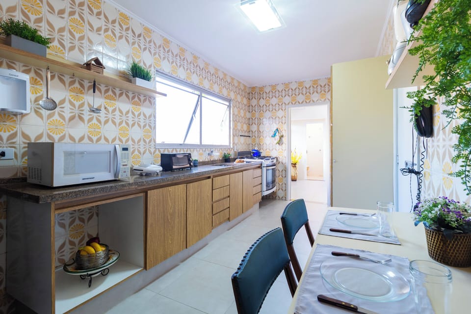 Apartment | Private kitchen | Toaster oven, paper towels, dining table