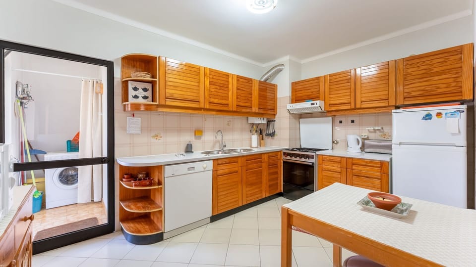Everything you need to prepare home-cooked meals during your stay. #HolidayKitchen #SelfCatering #LovelyStayPortugal #VacationRental
