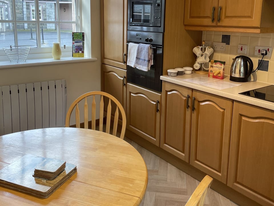 Fridge, microwave, toaster, cookware/dishes/utensils