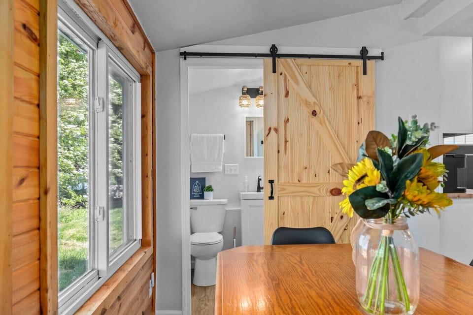 Full Bathroom: Features a stand up shower and is stocked with shampoo, conditioner, body wash, and a hair dryer.