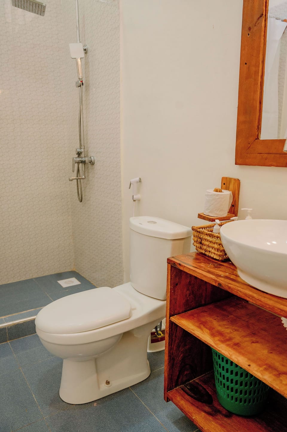 Shower, rainfall showerhead, slippers, towels