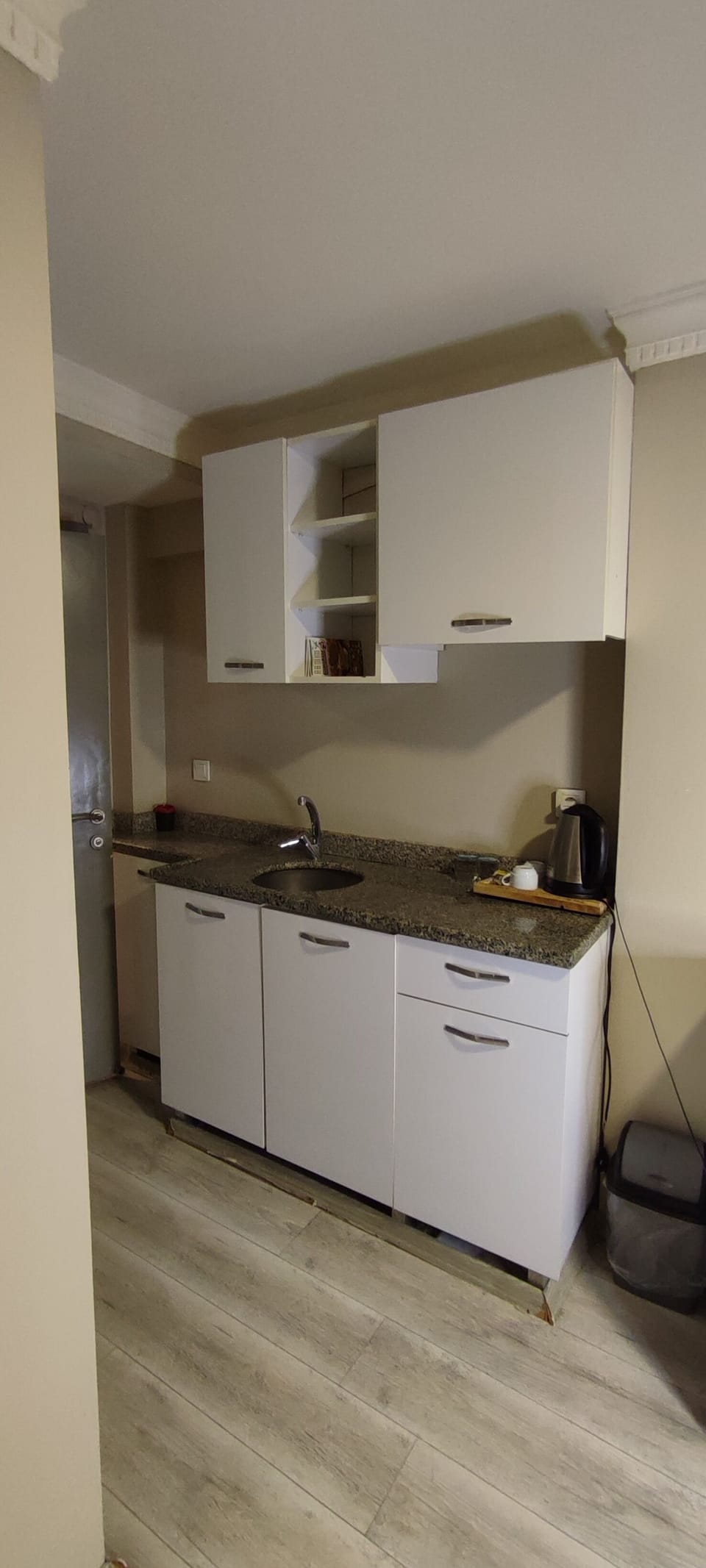 Fridge, coffee/tea maker, electric kettle, cookware/dishes/utensils