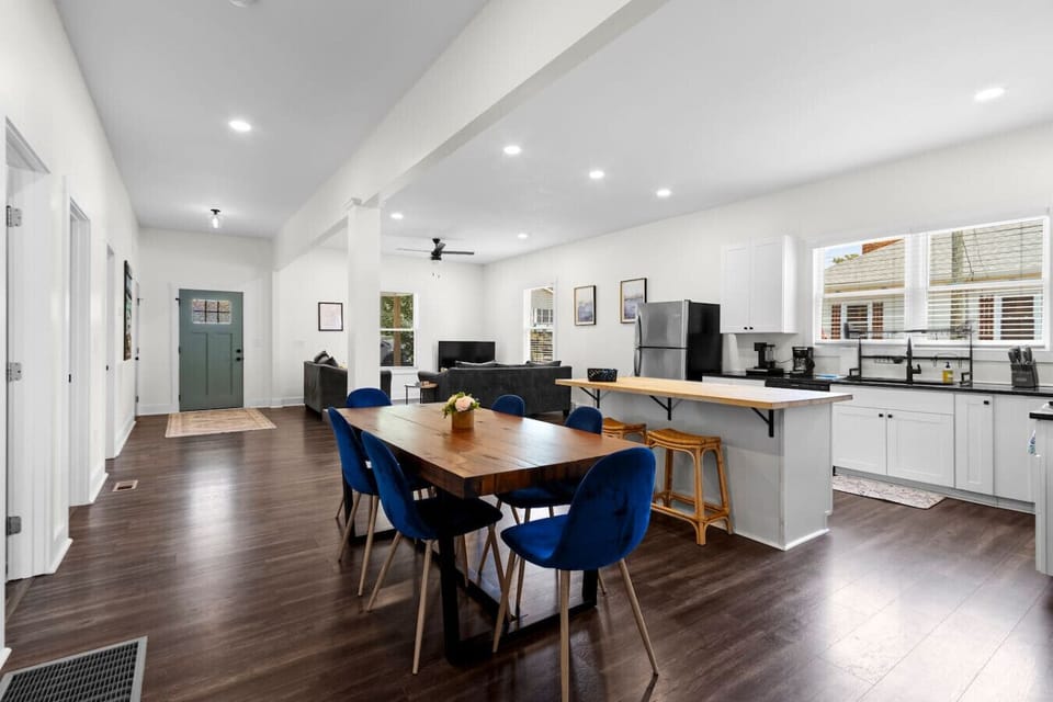 Step inside our modern comfort home featuring high ceilings, open living floor plan to enjoy time with friends and family over dinner, games, or a movie