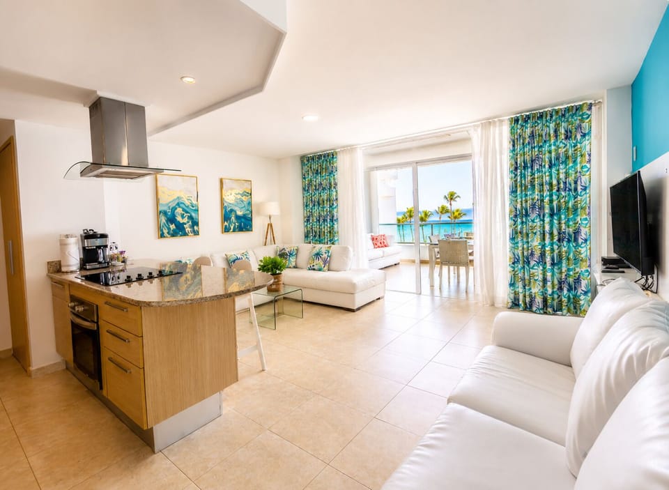 Beachfront Living Room – Relax with A/C, Smart TV, and ocean views — your cozy corner by the beach.