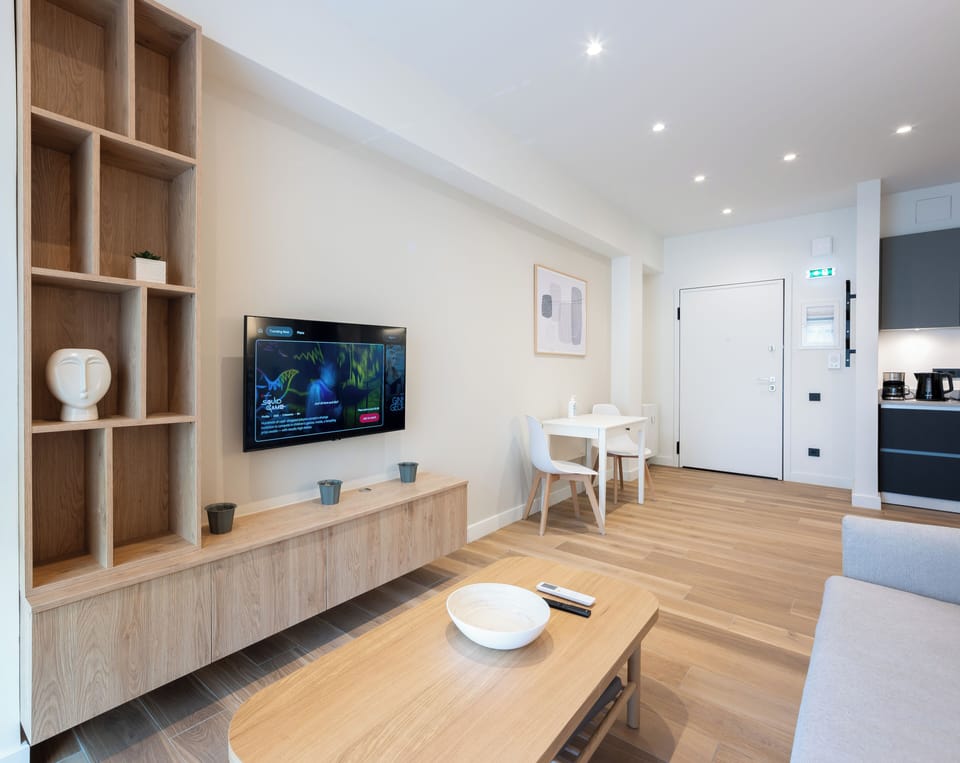 Deluxe Apartment, Balcony, City View | Living area | 40-inch Smart TV with digital channels