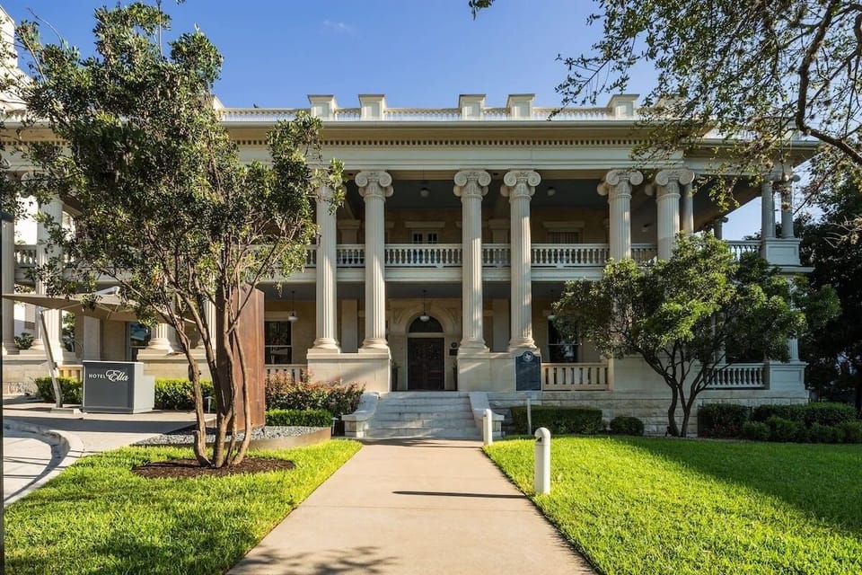 Arrive in style at this grand, columned historic retreat.