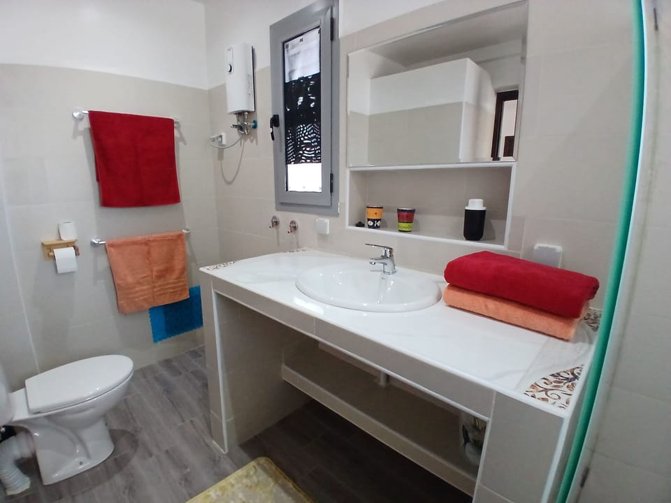 Shower, eco-friendly toiletries, hair dryer, towels