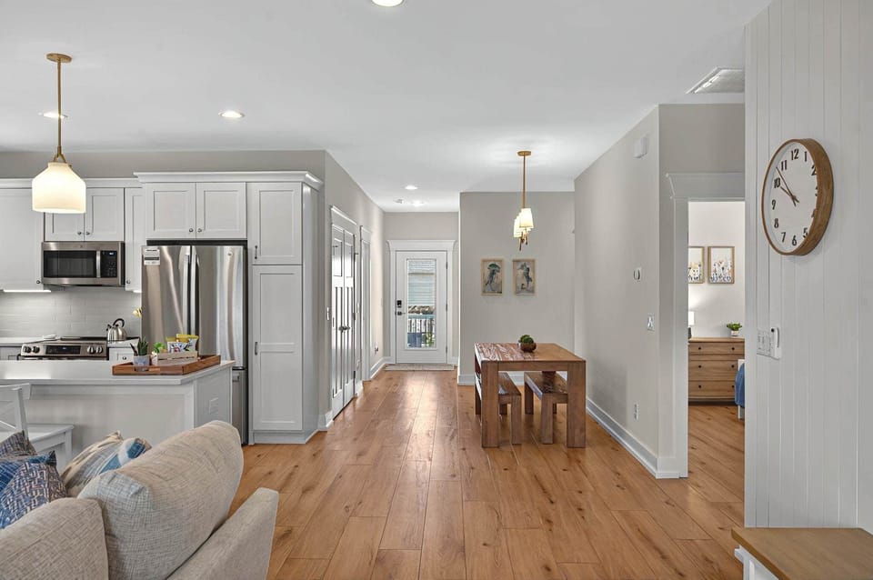 Make yourselves at home in the great room, which includes the kitchen, living room and dining area.