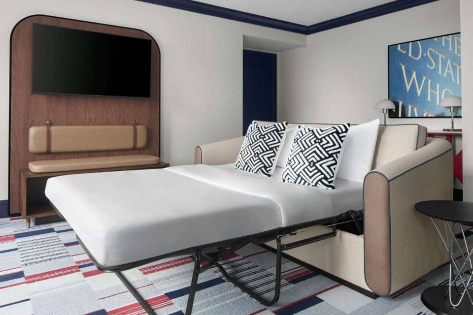 CLASSIC KING ROOM: Convertible sleeper sofa pulled out into a comfortable additional bed