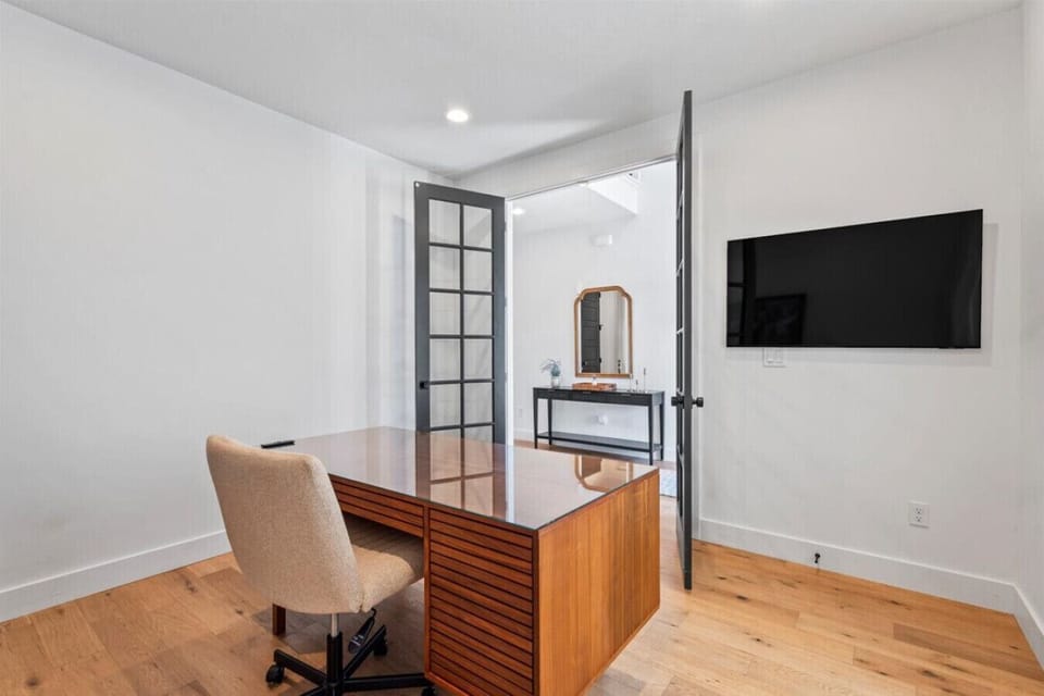 Dedicated workspace with desk and natural light