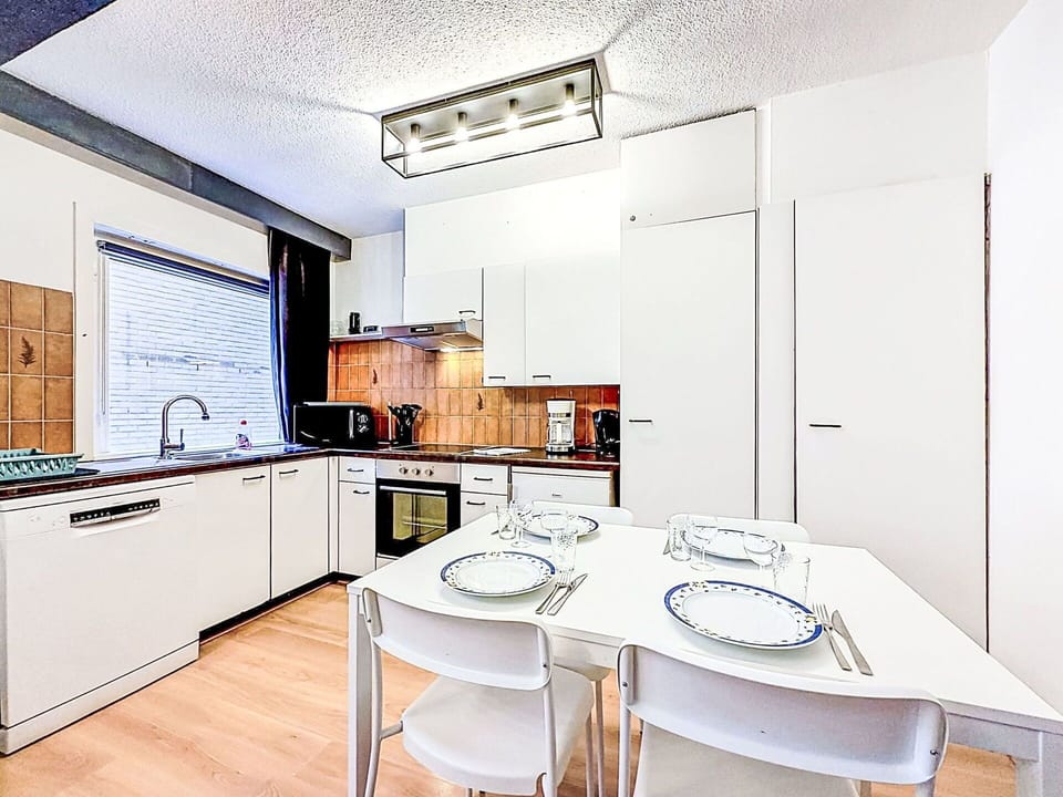 Interior Design, Kitchen, Ceiling, Flooring, Major Appliance, Kitchen Appliance, Furniture, Floor, Room, Countertop