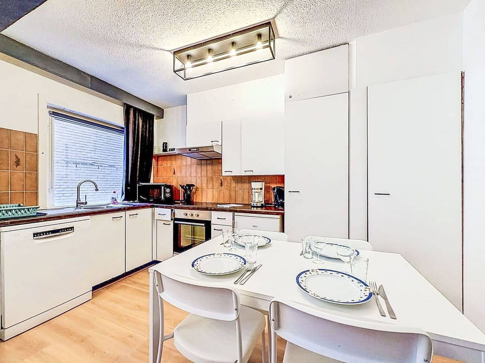 Interior Design, Ceiling, Flooring, Kitchen, Major Appliance, Floor, Furniture, Room, Kitchen Appliance, Lighting