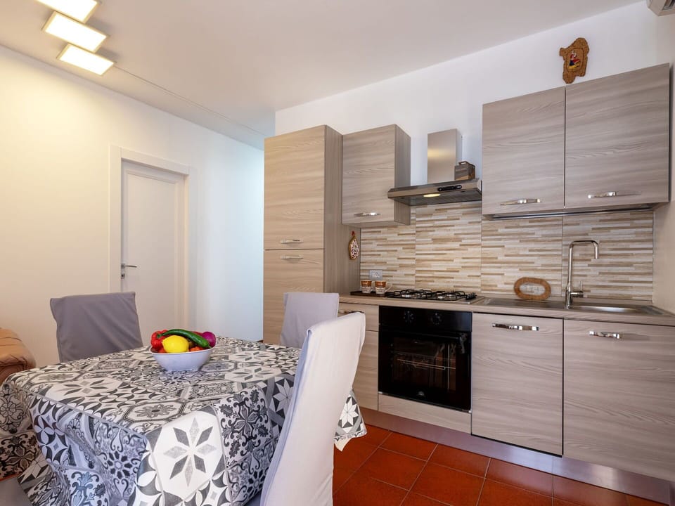 Interior Design, Flooring, Wood, Furniture, Floor, Major Appliance, Kitchen, Room, Countertop, Kitchen Appliance