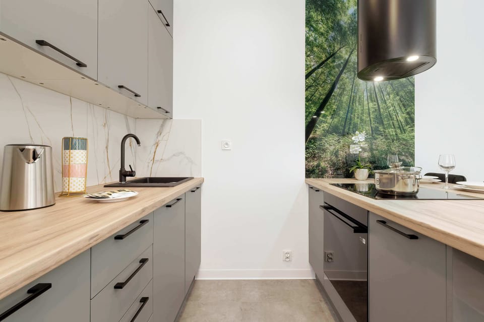 Quality appliances such as an oven and hob ensure that home-cooked meals can be prepared.
