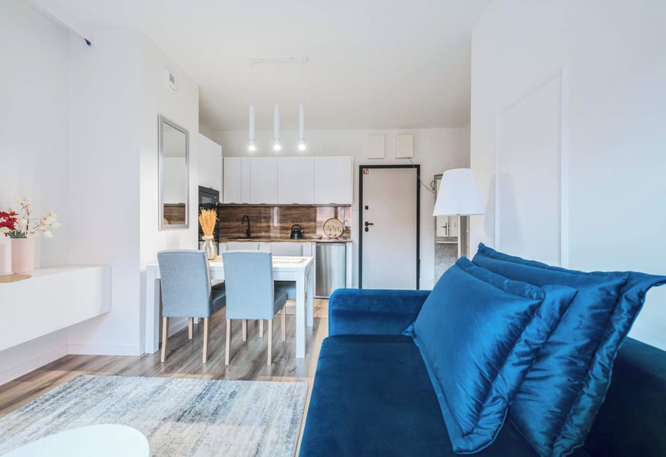This versatile living and dining space offers the perfect blend of comfort and functionality. Whether you're enjoying a meal with loved ones or relaxing on the sofa, this room has it all.