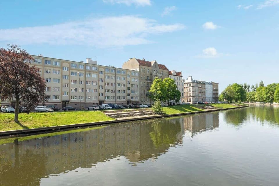 Dobra Street in Gdansk is located in a picturesque and quiet area, just a few steps from the heart of the Old Town. It is a charming, less-traveled street that retains much of the historic charm typical of this part of the city.