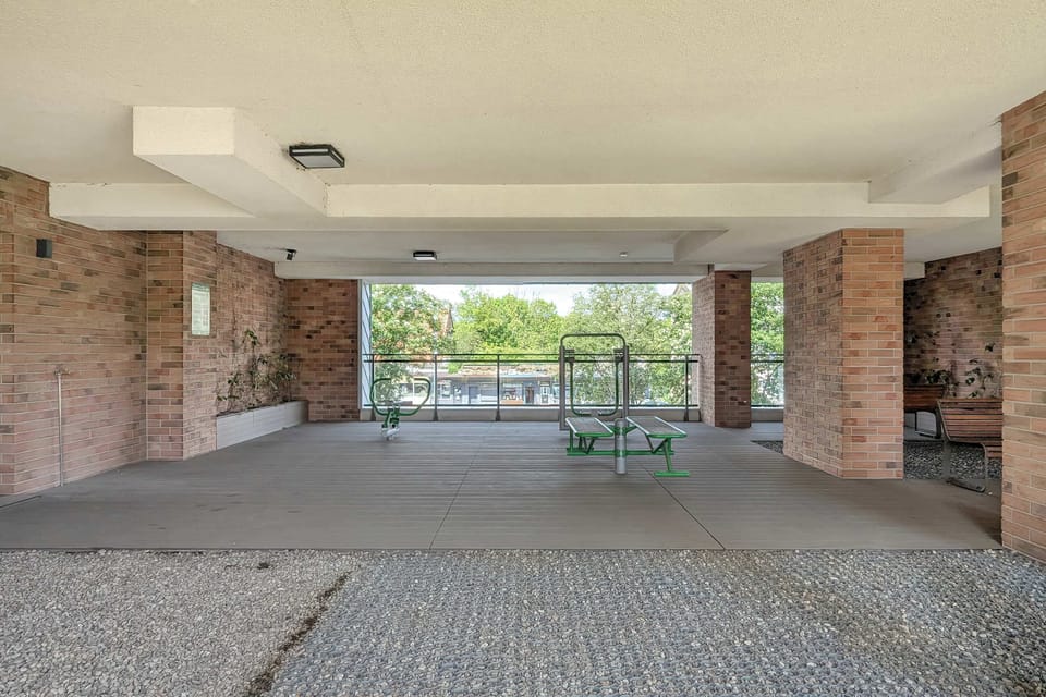 Open rooftop area offering fitness gear and a quiet spot to unwind. Surrounded by skyline views and fresh air.