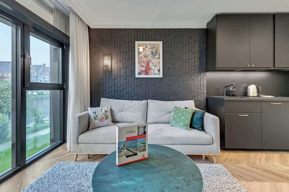 Understated elegance with a harmonious blend of bold textures, refined accents, and a tranquil ambiance.