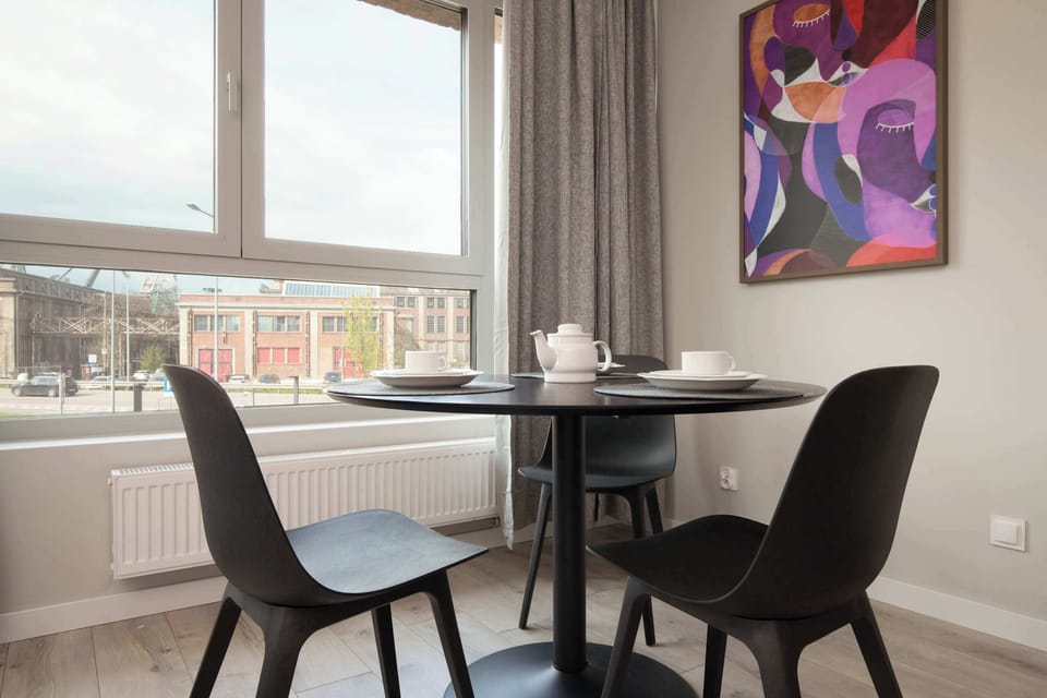 Enjoy your favorite shows on the flat-screen television in the elegant living area.