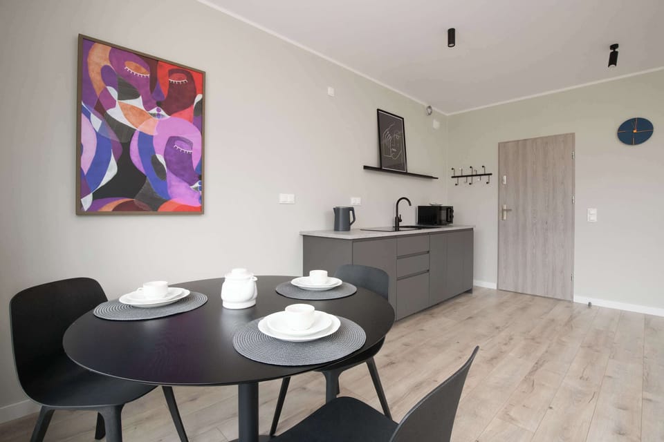 Cook and dine in style with the modern kitchenette and dining area.
