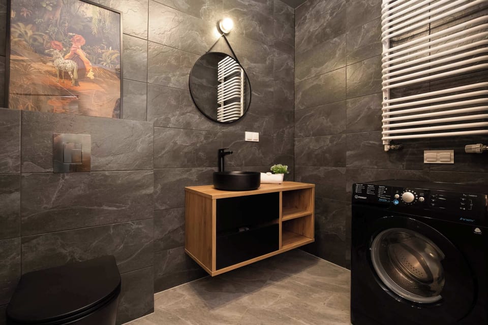 The bathroom offers a clean and functional space for your stay.