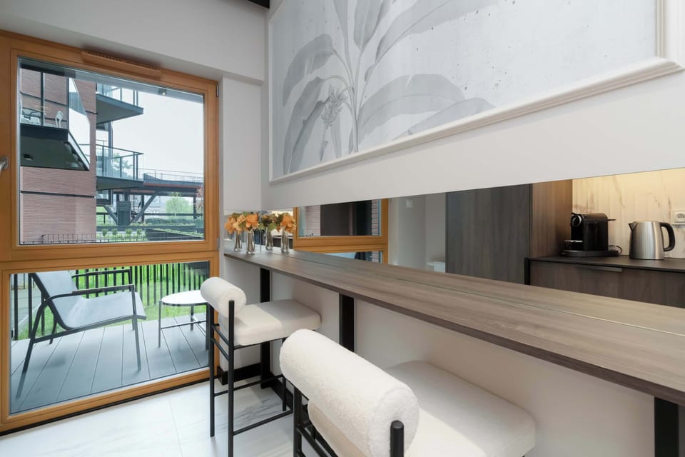 Tabletop with soft bar chairs. At the table top you can