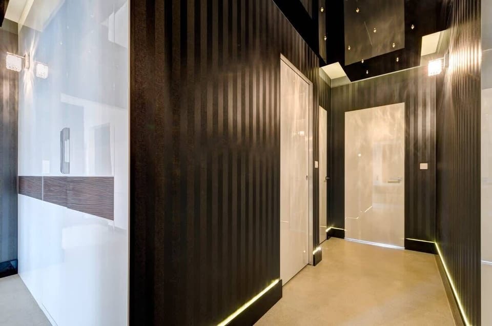 Another view of the elegant entrance area with contemporary design elements.