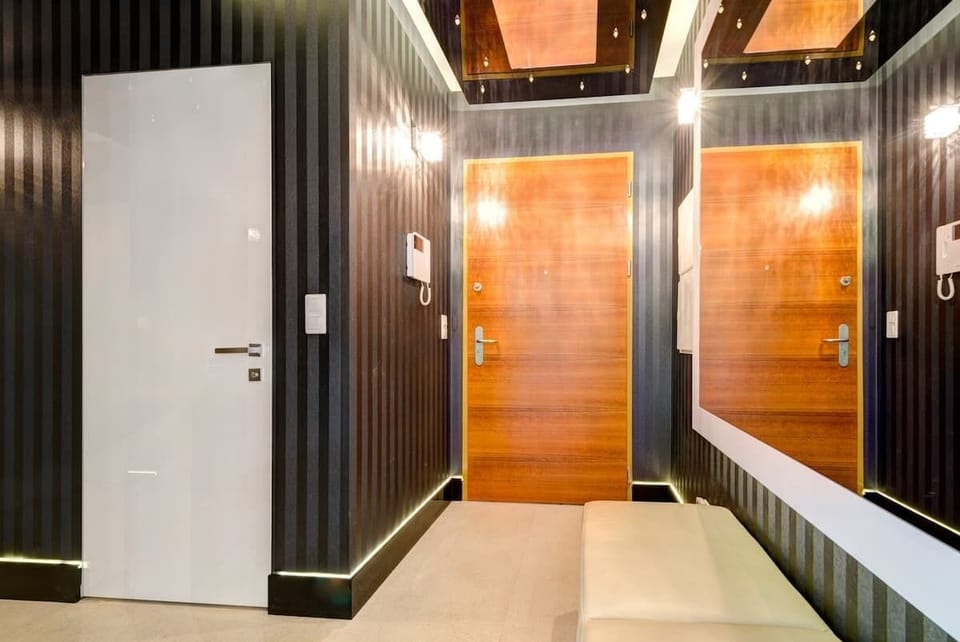 Welcoming entrance hallway with modern lighting features.