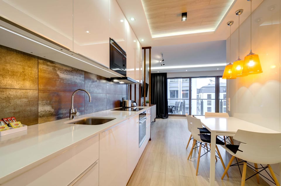 Fully equipped kitchenette with dining area, making it ideal for preparing meals and spending time with loved ones.