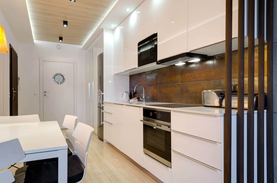 Fully equipped kitchenette with dining area.