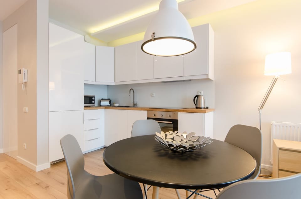 Dining area with fully equipped kitchenette, making it ideal for preparing meals and spending time with loved ones.