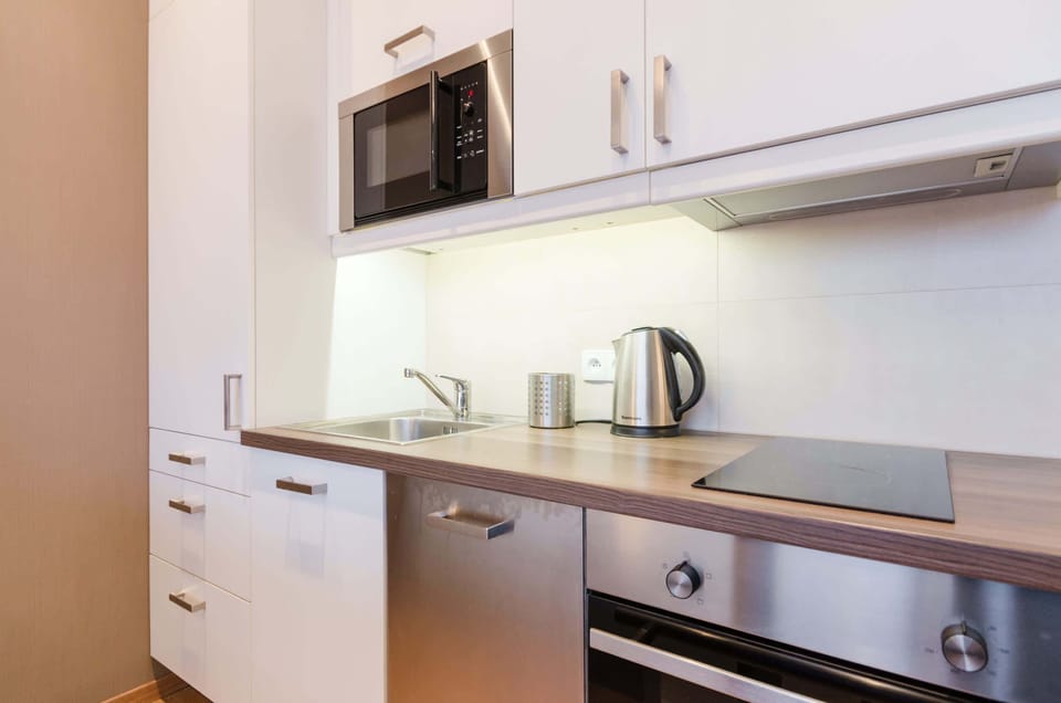 Functional kitchenette with quality appliances that ensure you can prepare home-cooked meals.